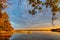 Jezioro Selmet Wielki lake landscape with vintage pier, reeds and wooded shoreline in Sedki in Masuria region of Poland