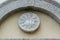 JHS Christogram of the stone above the lateral entrance of church of San Francesco, Scutari