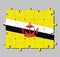 Jigsaw puzzle of Brunei Darussalam flag in red crest on yellow field cut by black and white diagonal stripes.