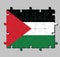 Jigsaw puzzle of Palestine flag in black white and green; with a red triangle based at the hoist.