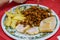 jijas, chorizo mince with fried eggs and fried potatoes, typical Spanish food from the Cantabrian region