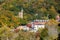 Jim Thorpe, Pennsylvania, U.S.A - October 17,2020 - The distance view of the buildings in the city surrounded by the fall foliage