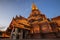 Jinghong, China - December 30, 2019: Big Golden Pagoda in Jinghong, Xishuangbanna, at dusk also called Dajin Pagoda