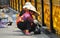 Jiu Chi Town, China: Women Painting Bridge Railing