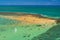 Joao Pessoa, ParaiÌba, Brazil on November 15, 2012. Red sand island, in Cabedelo, that appears at low tide, is one of the major