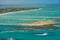 Joao Pessoa, ParaiÌba, Brazil on November 15, 2012. Red sand island, in Cabedelo, that appears at low tide, is one of the major