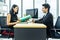 Job interview, Beautiful manager asian woman talking to a male job applicant at the desk,