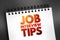 Job Interview Tips, text concept on notepad for presentations and reports