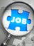 Job - Missing Puzzle Piece through Magnifier