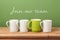 Job recruit concept with coffee cups and text `Join our team`. Business background