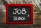 Job Search bar website drawing on chalk board wood background