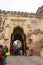 Jodhpur, India - January 1, 2015: Unidentified people walk through a gate at Mehrangarh Fort