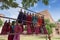 Jodhpur, Rajasthan, India - 19th October 2019 : Young Rajasthani woman selling hand made Rajaasthani colourful dolls of horse and