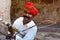 Jodhpur, Rajasthan, India, 2020. Closeup of Traditional Rajasthani sarangi player in his traditional dress and head gear turban