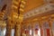 JODHPUR, RAJASTHAN, INDIA - DECEMBER 17, 2017: Golden Royal Palace room with architectural details, carvings and columns at Mehran