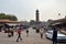 Jodphur, India - January 1, 2015: Unidentified people shopping at market under the clock tower