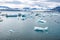 joekulsar lagoon with icebergs and eroding glacier in Iceland