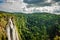 Jog falls from above flat angle shots with green dense forests