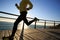 Jogger morning exercise on seaside boardwalk