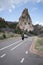 Jogger passing The Praying Hands rock formation in the Garden of the Gods in Colorado Springs.