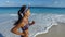 Jogger Running On Idyllic Beach - Woman Runner
