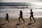 Joggers family have fun on beach run and jump at sunset. Father, mother, baby son run. Child jump with fun by water pool