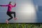 Jogging Concepts. Running Mature Sportswoman Having Outdoor Jogging Training Against Metal Wall Background