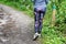 Jogging legs girl athlete runner feet running in nature park Woman fitness park active lifestyle concept