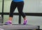 Jogging to lose weight to be healthy, legs wearing sneakers runni
