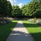 Jogging track in garden of public park among greenery trees, flower shrub and bush, black asfalt concrete walkway
