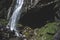 Jogini waterfall and cave behind near the Vashisht village