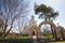 John the Apostle, russian orthodox church in Kynashiv, Ukraine, temple and entrance to the churchyard, chestnut and pine trees