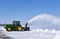 John Deere 6145R tractor blowing snow