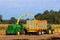 John Deere 6930 tractor and John Deere 7480i Forage Harvester at work