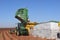 John Deere and boll buggy on the Llano Estacado