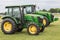 John Deere Models 5100E and 8335R Tractors