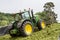 John Deere tractor pushing silage at the clamp