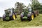 John Deere tractors pushing silage at the clamp