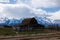 The John Moulton barn with the snow covered Teton Mountains in the background in Jackson Hole