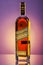 Johnnie Walker Gold Label blended whisky on gradient background