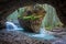 Johnston Canyon cave in Spring season with waterfalls, Johnston Canyon Trail, Alberta, Canada