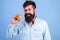 Join healthy lifestyle. Man with beard hipster hold apple fruit hand. Nutrition facts and health benefits. Healthy