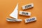 Join our team symbol. Wooden blocks with words Join our team. Beautiful orange background with boat. Business and Join our team