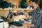 Joiner woodworker choosing construction carpentry tools in his workshop. DIY concept