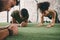 Joining group exercises diversifies your fitness routine. a fitness group planking while working out at the gym.