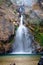 Jokkradin waterfall smooth water between the rocky mountain, Thailand