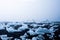 Jokulsarlon Beach Diamond Beach with giant ice rocks on the lava black sand beach.