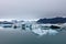 Jokulsarlon glacier lagoon, Iceland at sunset. Beautiful glaciers flow through the mountains. Cold landscape picture of icelandic