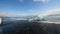 Jokulsarlon lagoon, Iceland. Slow motion view of Icebergs on the beach in summer season