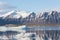 Jokulsarlon winter season lake with black volcano mountain